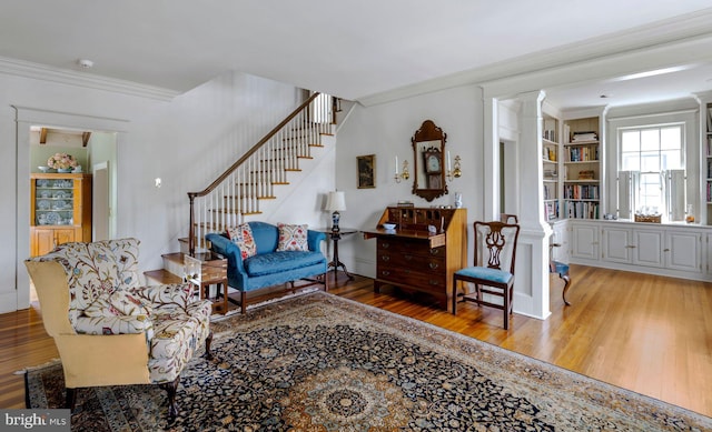 528 E Center Ave, Newtown, PA 18940 - living area featuring wood finished floors, ornamental molding, and stairs