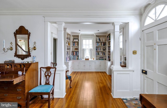 528 E Center Ave, Newtown, PA 18940 - foyer entrance with decorative columns, light wood finished floors, and crown molding