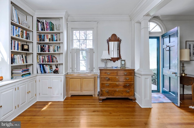 528 E Center Ave, Newtown, PA 18940 - sitting room with light wood-type flooring, decorative columns, crown molding, and built in features