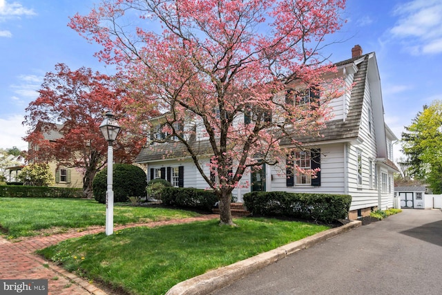 528 E Center Ave, Newtown, PA 18940 - view of front of property featuring a chimney and a front yard