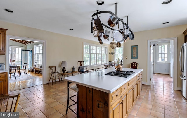 528 E Center Ave, Newtown, PA 18940 - kitchen with plenty of natural light, appliances with stainless steel finishes, light tile patterned flooring, light countertops, and recessed lighting