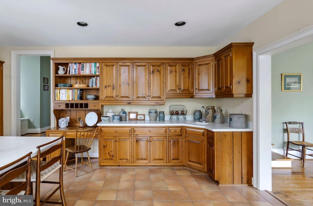 528 E Center Ave, Newtown, PA 18940 - kitchen with brown cabinetry, light countertops, and open shelves
