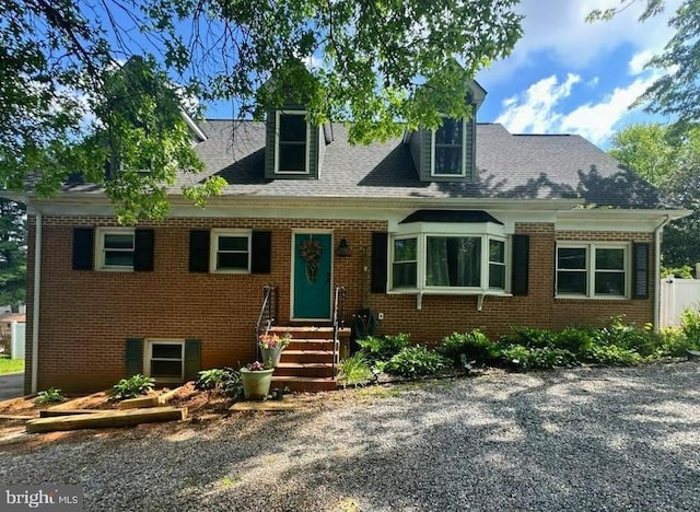 4406 Old National Pike, Middletown, MD 21769 - cape cod house featuring entry steps, brick siding, and roof with shingles