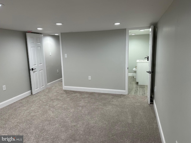 1402 W Saratoga St, Baltimore, MD 21223 - finished basement with recessed lighting, carpet floors, and baseboards