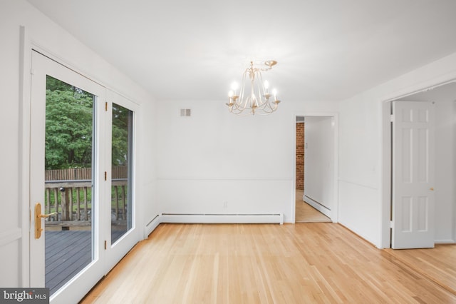 8007 Lewinsville Rd, Mclean, VA 22102 - spare room featuring a chandelier, wood finished floors, and a baseboard heating unit