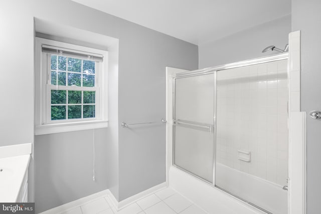 8007 Lewinsville Rd, Mclean, VA 22102 - full bath with tile patterned flooring, enclosed tub / shower combo, vanity, and baseboards