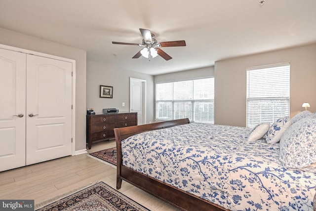 15255 Leicestershire St, Woodbridge, VA 22191 - bedroom with light wood-type flooring, a ceiling fan, and baseboards