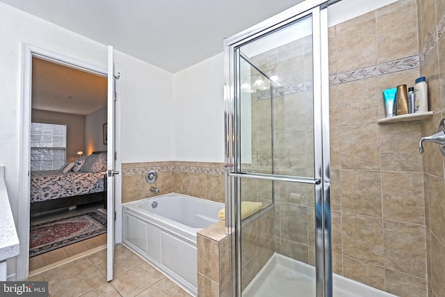 15255 Leicestershire St, Woodbridge, VA 22191 - full bathroom featuring a bath, a shower stall, connected bathroom, and tile patterned flooring