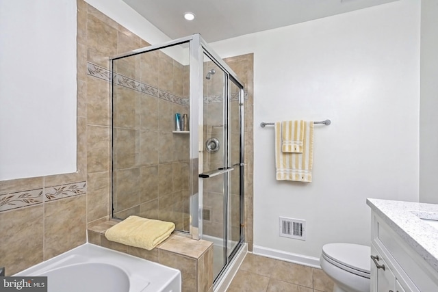 15255 Leicestershire St, Woodbridge, VA 22191 - bathroom with a stall shower, vanity, a garden tub, toilet, and baseboards