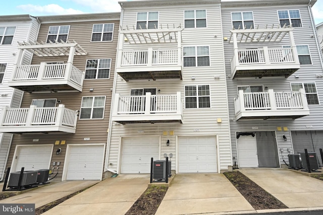 15255 Leicestershire St, Woodbridge, VA 22191 - view of building exterior featuring a garage and central air condition unit