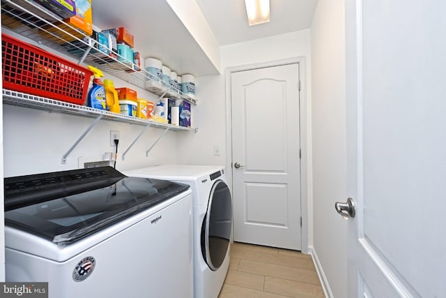15255 Leicestershire St, Woodbridge, VA 22191 - laundry area with separate washer and dryer and light tile patterned floors