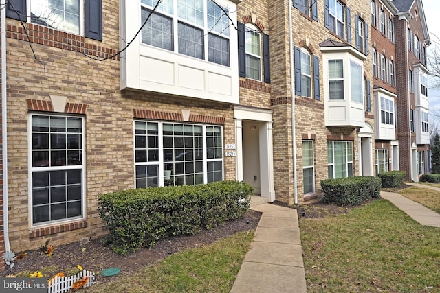 15255 Leicestershire St, Woodbridge, VA 22191 - doorway to property featuring brick siding