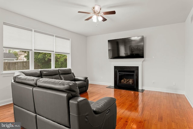 255 Summit Ave, Conshohocken, PA 19428 - living room with a ceiling fan, light wood-type flooring, baseboards, and a glass covered fireplace