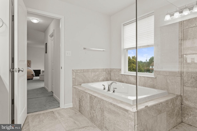 255 Summit Ave, Conshohocken, PA 19428 - ensuite bathroom featuring a bath and baseboards