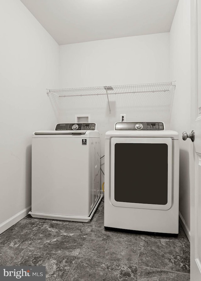 255 Summit Ave, Conshohocken, PA 19428 - washroom with washing machine and clothes dryer and baseboards