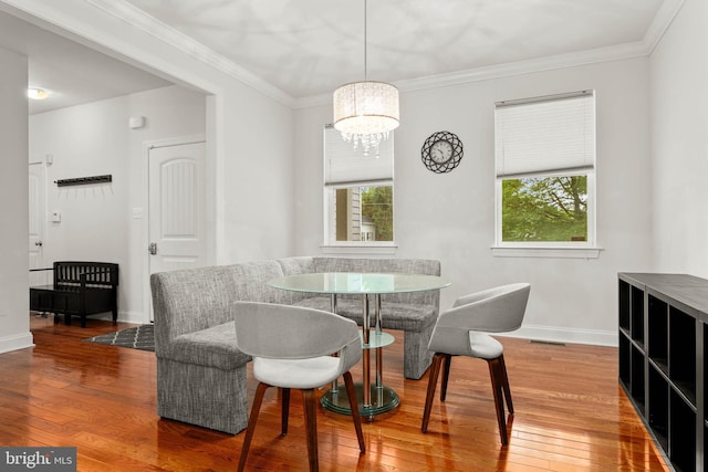 255 Summit Ave, Conshohocken, PA 19428 - dining space featuring wood-type flooring, baseboards, healthy amount of natural light, and crown molding
