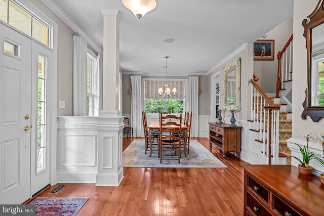 1165 Fulling Mill Ln, Haddon Heights, NJ 08035 - foyer featuring ornate columns, hardwood / wood-style flooring, healthy amount of natural light, wainscoting, and crown molding