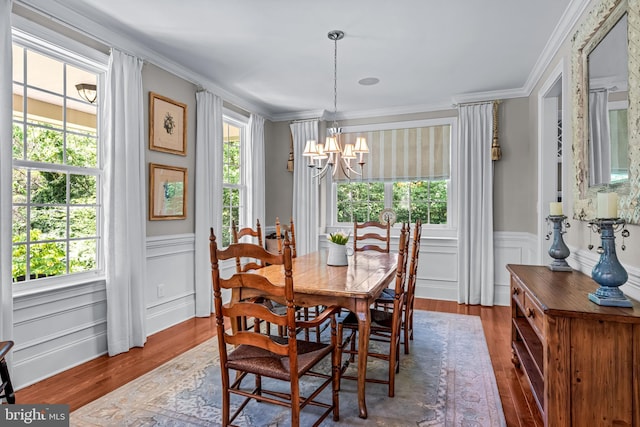 1165 Fulling Mill Ln, Haddon Heights, NJ 08035 - dining space with a chandelier, healthy amount of natural light, wood finished floors, crown molding, and a wainscoted wall