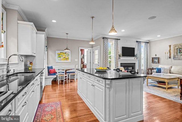 1165 Fulling Mill Ln, Haddon Heights, NJ 08035 - kitchen featuring recessed lighting, crown molding, open floor plan, white cabinetry, and light wood-style floors