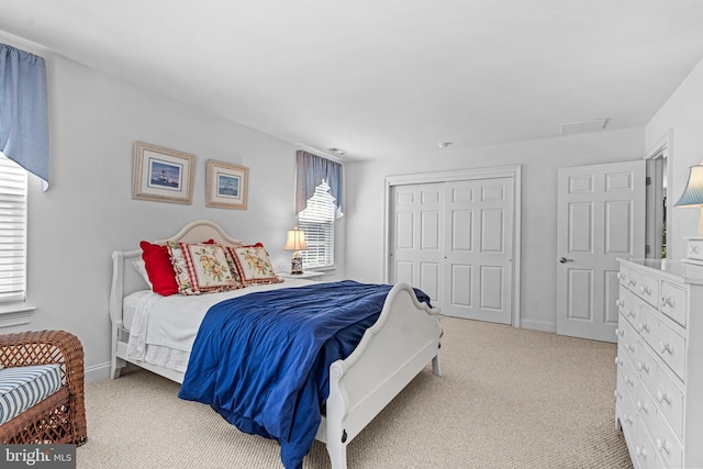 1165 Fulling Mill Ln, Haddon Heights, NJ 08035 - bedroom with multiple windows, light carpet, and a closet
