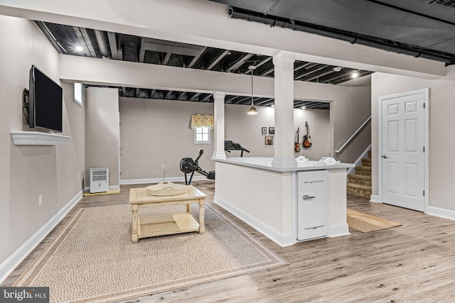 1165 Fulling Mill Ln, Haddon Heights, NJ 08035 - below grade area with light wood finished floors and stairway