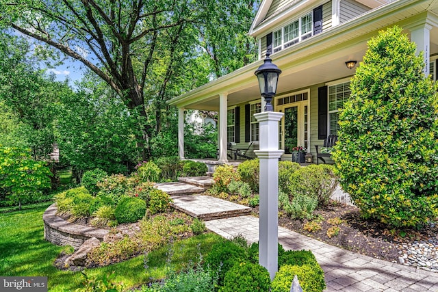 1165 Fulling Mill Ln, Haddon Heights, NJ 08035 - view of exterior entry featuring covered porch