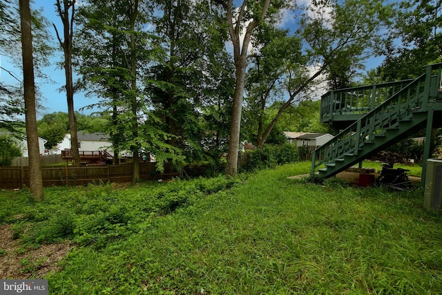 13732 Moccasin Ct, Woodbridge, VA 22193 - view of yard featuring stairway and a deck