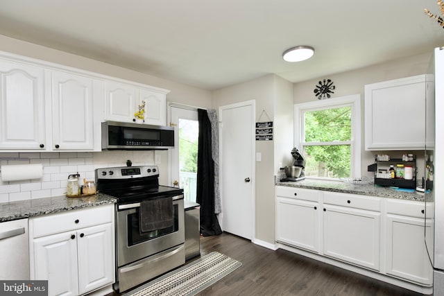 13732 Moccasin Ct, Woodbridge, VA 22193 - kitchen with appliances with stainless steel finishes, white cabinets, decorative backsplash, and light stone counters