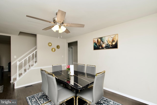 13732 Moccasin Ct, Woodbridge, VA 22193 - dining space featuring stairs, dark wood-style flooring, baseboards, and a ceiling fan