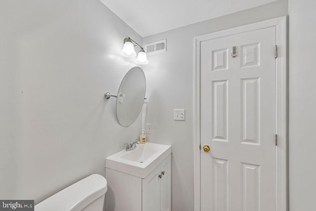 20429 Ambassador Ter Unit 20429, Germantown, MD 20874 - half bathroom featuring vanity and toilet