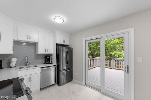 20429 Ambassador Ter Unit 20429, Germantown, MD 20874 - kitchen with freestanding refrigerator, dishwasher, a sink, light countertops, and tasteful backsplash