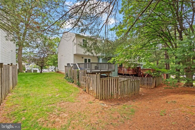 20429 Ambassador Ter Unit 20429, Germantown, MD 20874 - view of yard featuring a wooden deck
