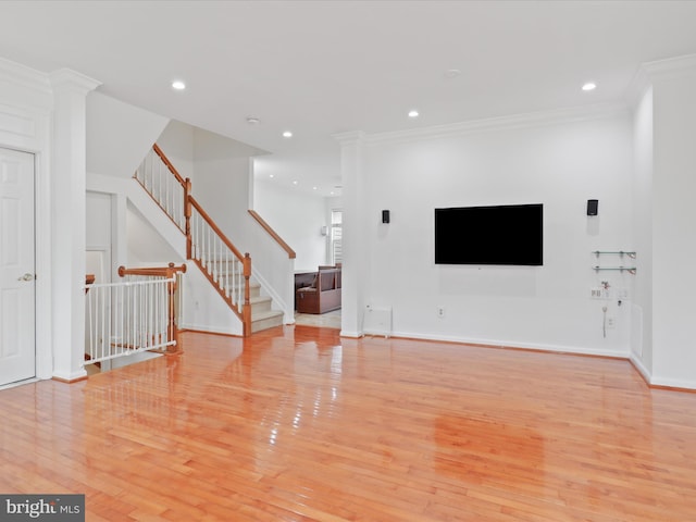 2642 Logan Wood Dr, Herndon, VA 20171 - unfurnished living room featuring light wood finished floors, recessed lighting, crown molding, baseboards, and stairway