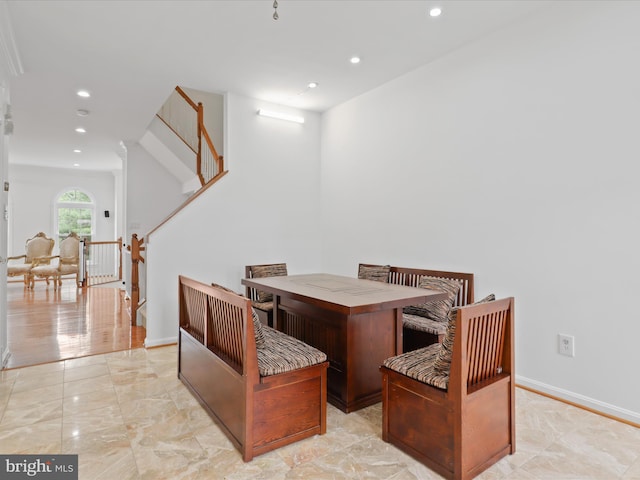 2642 Logan Wood Dr, Herndon, VA 20171 - dining space featuring recessed lighting, light marble finish flooring, baseboards, and stairs