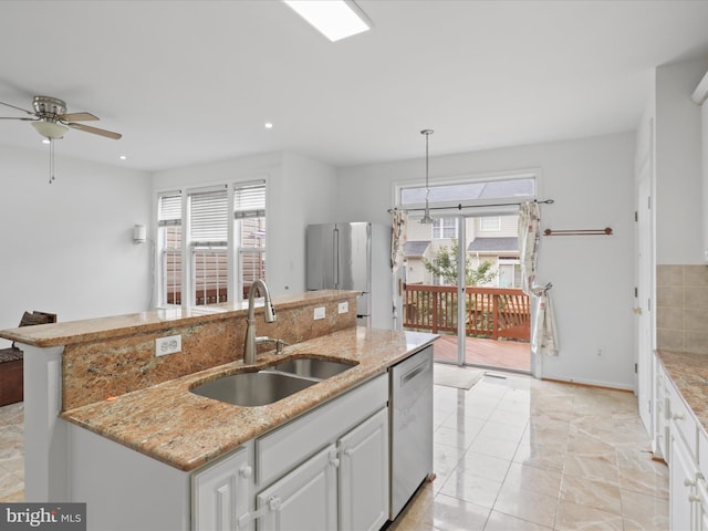 2642 Logan Wood Dr, Herndon, VA 20171 - kitchen with a sink, appliances with stainless steel finishes, a center island with sink, plenty of natural light, and recessed lighting