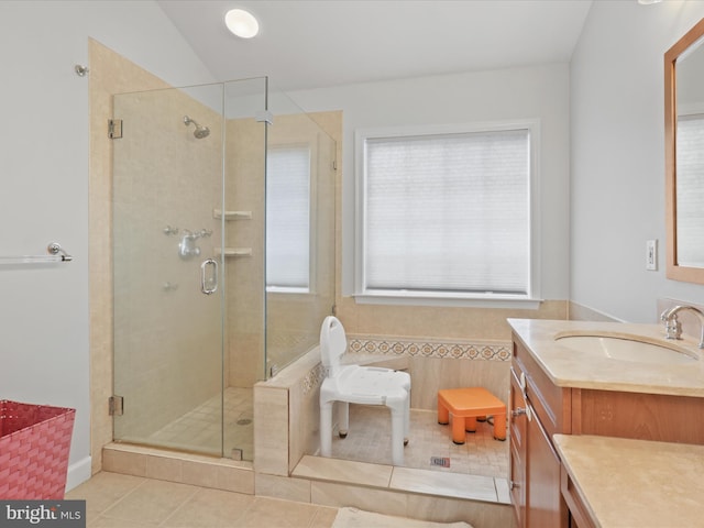 2642 Logan Wood Dr, Herndon, VA 20171 - bathroom with vanity, tile patterned flooring, and a stall shower