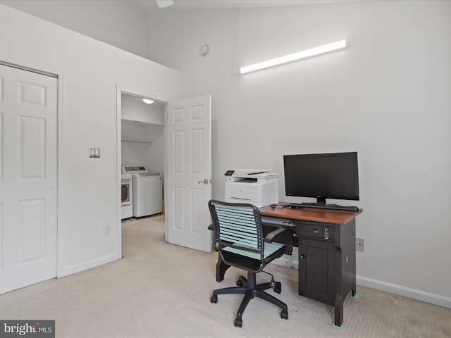 2642 Logan Wood Dr, Herndon, VA 20171 - office area featuring separate washer and dryer, light carpet, baseboards, and a towering ceiling