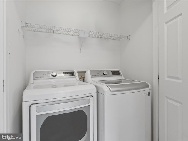 2642 Logan Wood Dr, Herndon, VA 20171 - laundry area featuring separate washer and dryer
