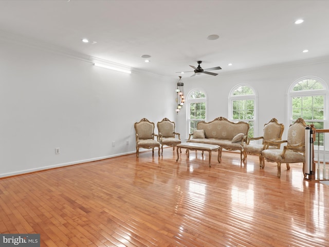 2642 Logan Wood Dr, Herndon, VA 20171 - living area featuring crown molding, ceiling fan, light wood finished floors, and recessed lighting