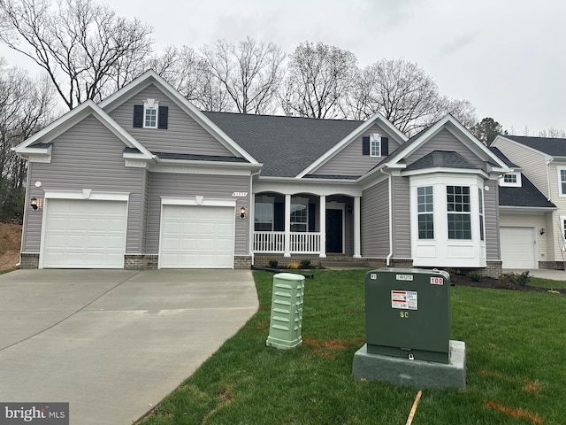 41535 Fairwood Ct, Leonardtown, MD 20650 - traditional-style house featuring driveway, a porch, a front yard, and roof with shingles