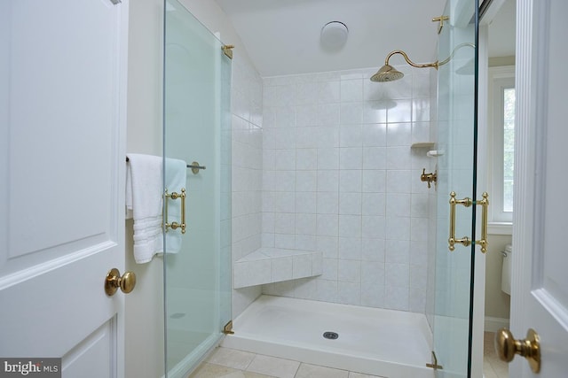 5403 Center St, Chevy Chase, MD 20815 - bathroom featuring a tile shower, tile patterned flooring, and toilet