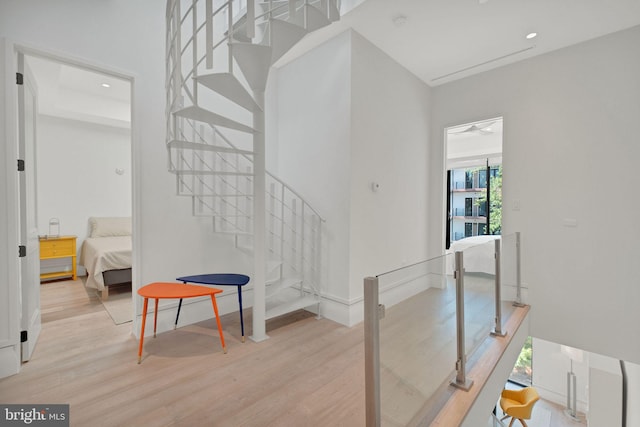 1837 Wyoming Ave NW Unit D, Washington, DC 20009 - staircase featuring wood finished floors, a high ceiling, recessed lighting, and baseboards