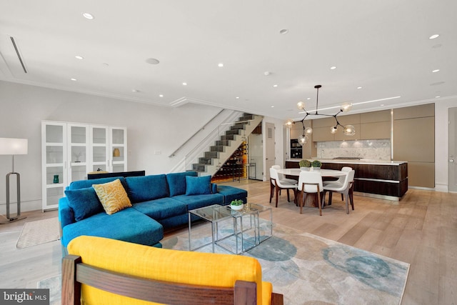 1837 Wyoming Ave NW Unit D, Washington, DC 20009 - living area with crown molding, light wood-style flooring, stairway, and recessed lighting