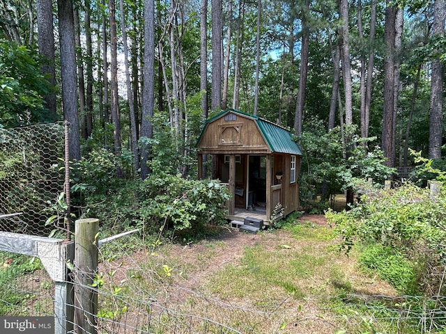 76 Red Burke Ct, Front Royal, VA 22630 - view of shed featuring a view of trees