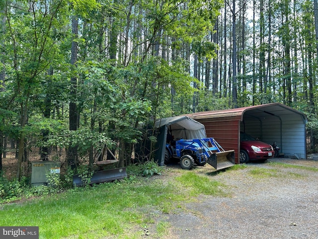 76 Red Burke Ct, Front Royal, VA 22630 - view of vehicle parking with gravel driveway and a detached carport