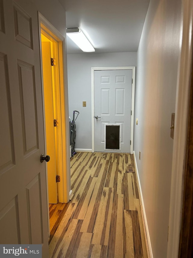 76 Red Burke Ct, Front Royal, VA 22630 - corridor with baseboards and light wood-style flooring