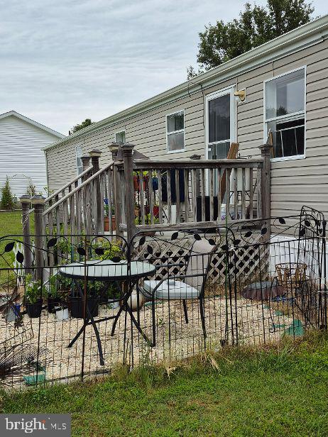 9080 Gold Finch Ct, Hebron, MD 21830 - back of house with a wooden deck