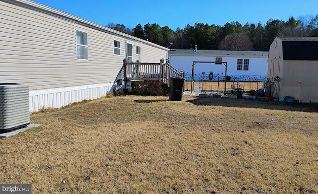 9080 Gold Finch Ct, Hebron, MD 21830 - view of grassy yard featuring central AC unit