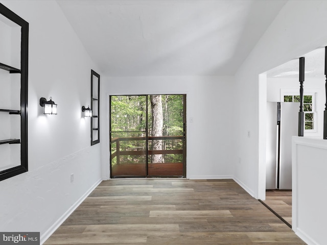 153 Bear Track Rd, Augusta, WV 26704 - empty room featuring wood finished floors, baseboards, and lofted ceiling