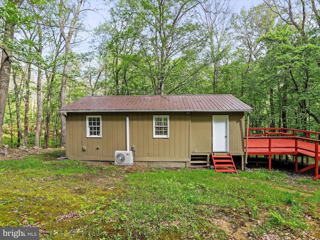 153 Bear Track Rd, Augusta, WV 26704 - rear view of house with ac unit, metal roof, and a wooden deck